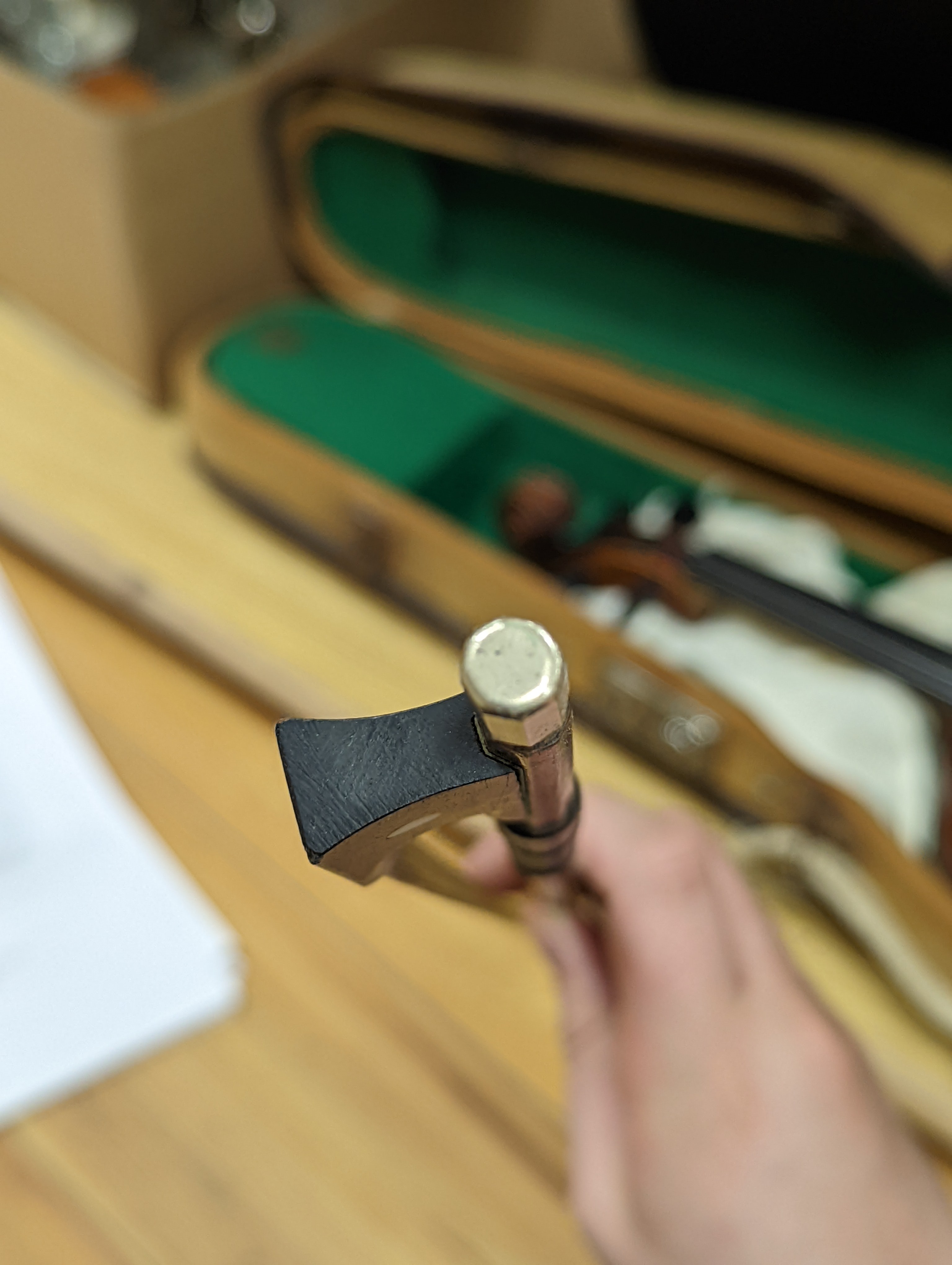 An early 20th century French vioilin, cased with bow and a cased saxon violin